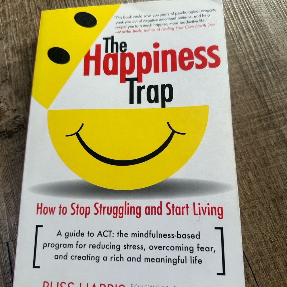 The Happiness Trap by Russ Harris - Yellow and Black Cover